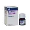Dostinex 0.5 mg - White and blue manufacturer box and small brown glass bottle for cabergoline tablets by Pfizer.