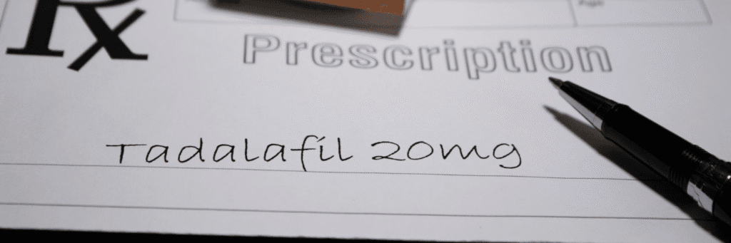 Sildenafil vs Tadalafil: An Honest Comparison - Tadalafil 20mg - Hand-written prescription for Tadalafil 20mg on a white medical form with a silver pen.
